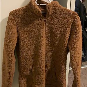 Brown teddy bear sweater